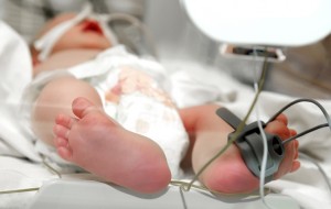Newborn baby foot in incubator