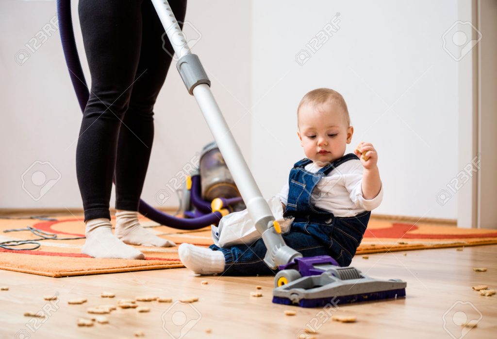 Cleaning home - mother and child