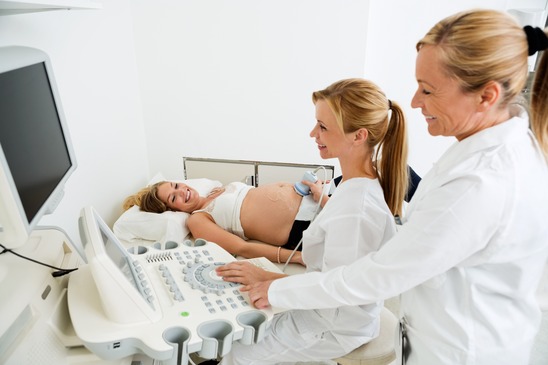 Gynecologists Performing An Ultrasound